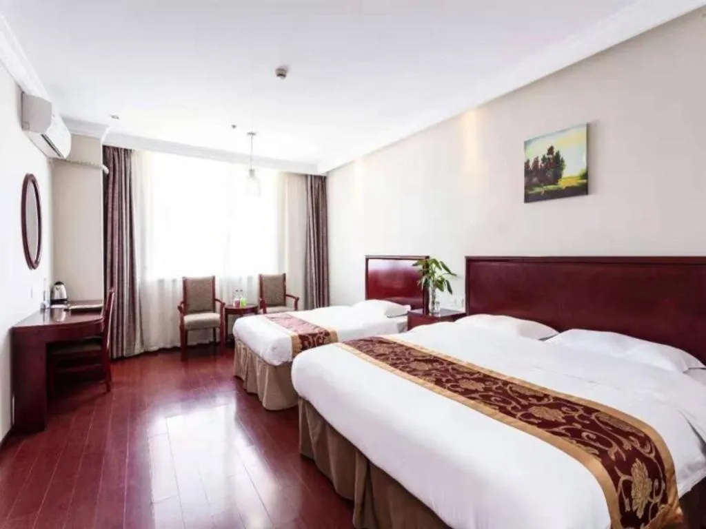 Bed in GreenTree Inn Shanghai Changxing Island Yuansha Fishing Port Hotel