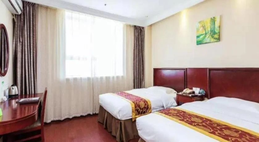 Bed in GreenTree Inn Shanghai Changxing Island Yuansha Fishing Port Hotel