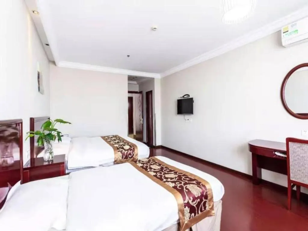 Bed in GreenTree Inn Shanghai Changxing Island Yuansha Fishing Port Hotel