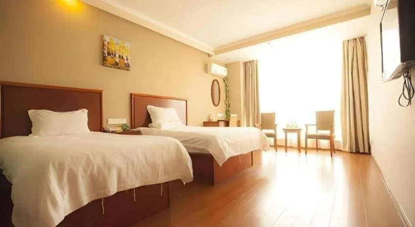 Bed in GreenTree Inn Shanghai Changxing Island Yuansha Fishing Port Hotel