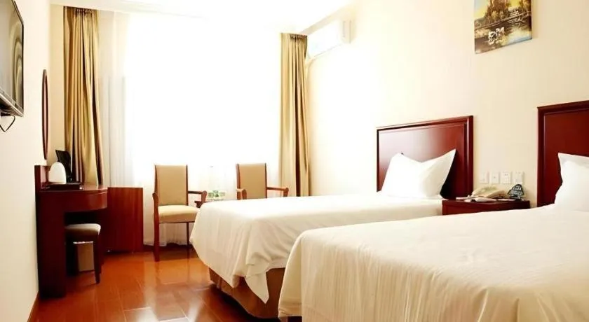 Bed in GreenTree Inn Shanghai Changxing Island Yuansha Fishing Port Hotel