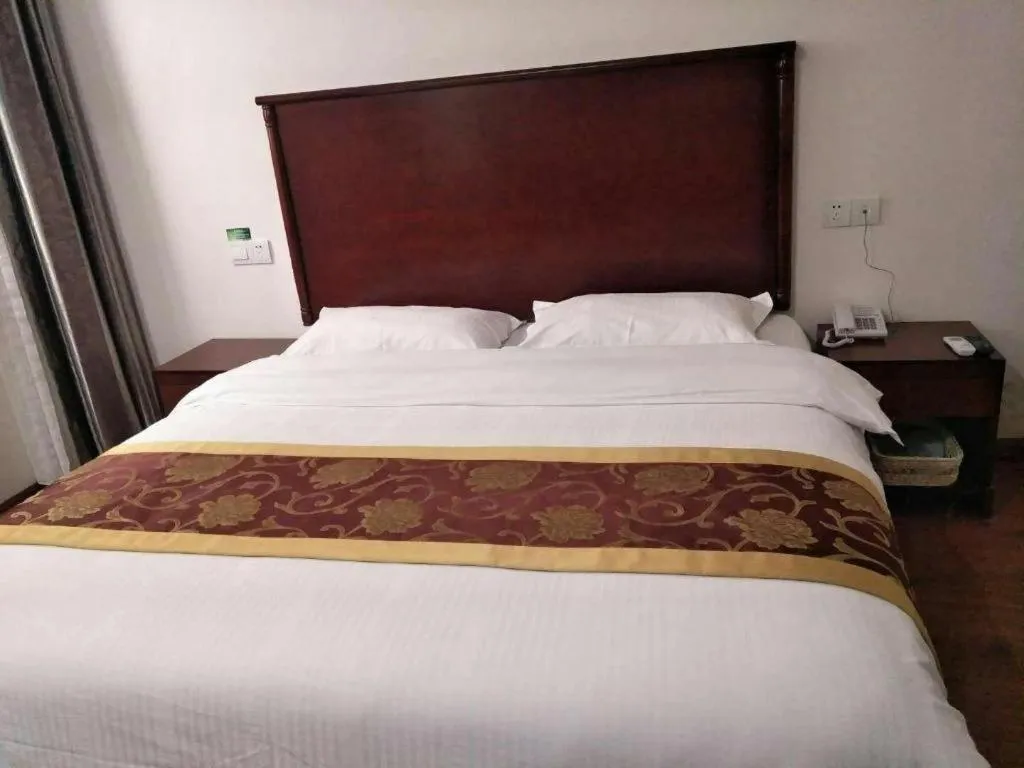 Bed in GreenTree Inn Shanghai Changxing Island Yuansha Fishing Port Hotel