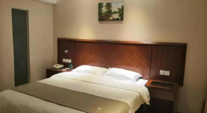 Bed in GreenTree Inn Shanghai Caohejing Development Zone Songjiang Park Jiuxin Road Business Hotel
