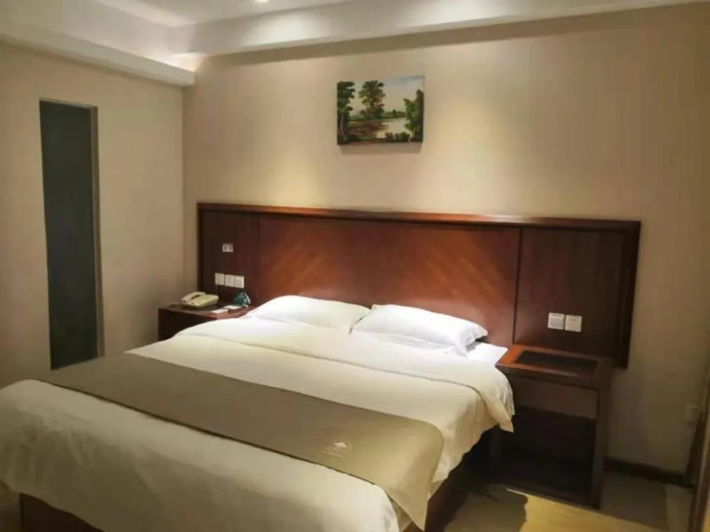 Bed in GreenTree Inn Shanghai Caohejing Development Zone Songjiang Park Jiuxin Road Business Hotel
