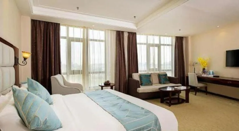 Bed in Xinxiang Zhongzhou Yihe Hotel