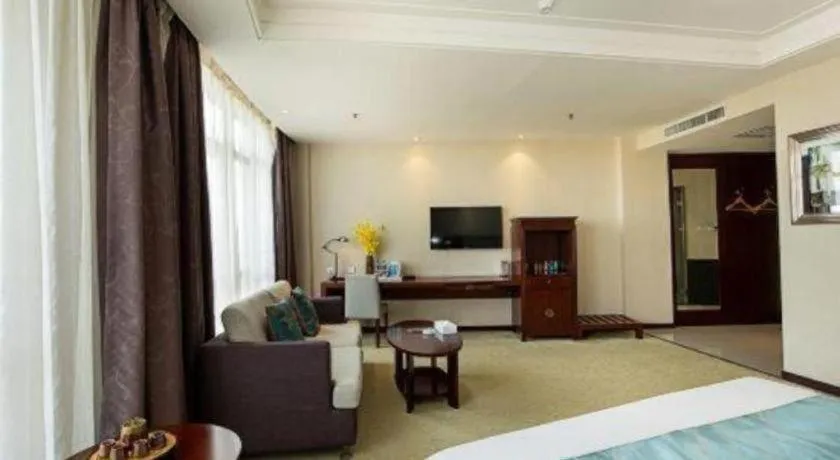 Bed in Xinxiang Zhongzhou Yihe Hotel