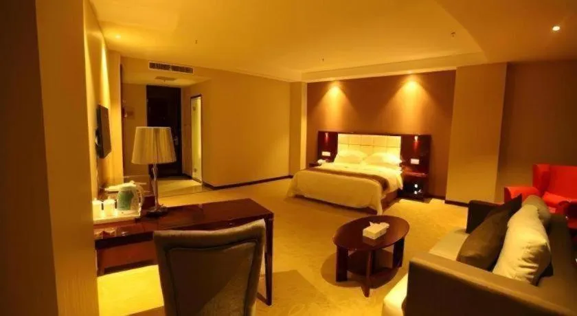 Bed in Xinxiang Zhongzhou Yihe Hotel