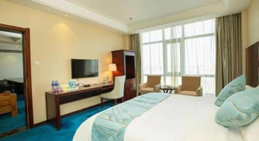 Bed in Xinxiang Zhongzhou Yihe Hotel