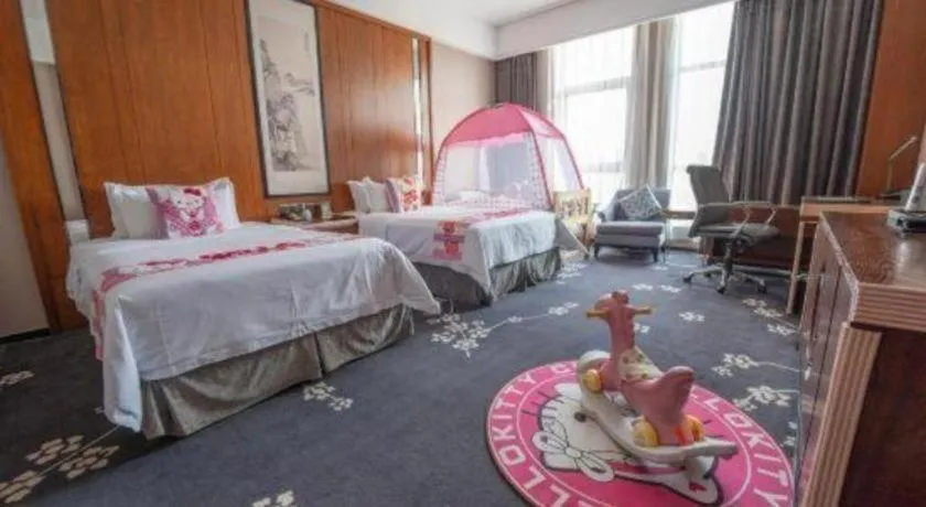 Bed in Jiyuan Oriental Jianguo Hotel