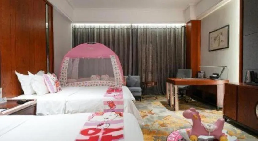 Bed in Jiyuan Oriental Jianguo Hotel