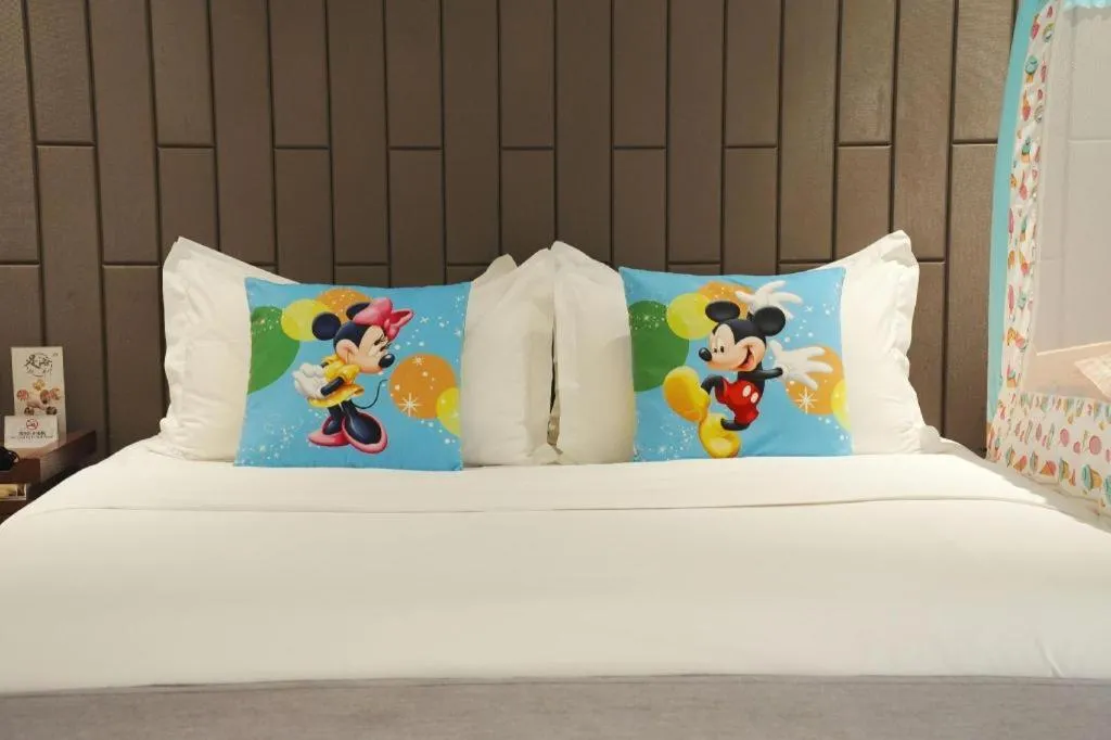 Bed in Jiyuan Oriental Jianguo Hotel