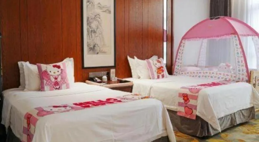 Bed in Jiyuan Oriental Jianguo Hotel