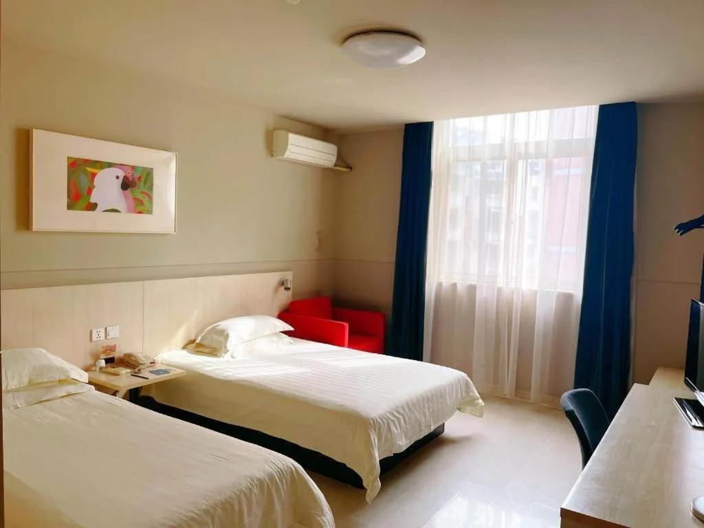 Bed in Jinjiang Inn Tai Zhou Xinghua Yingwu Bridge Branch