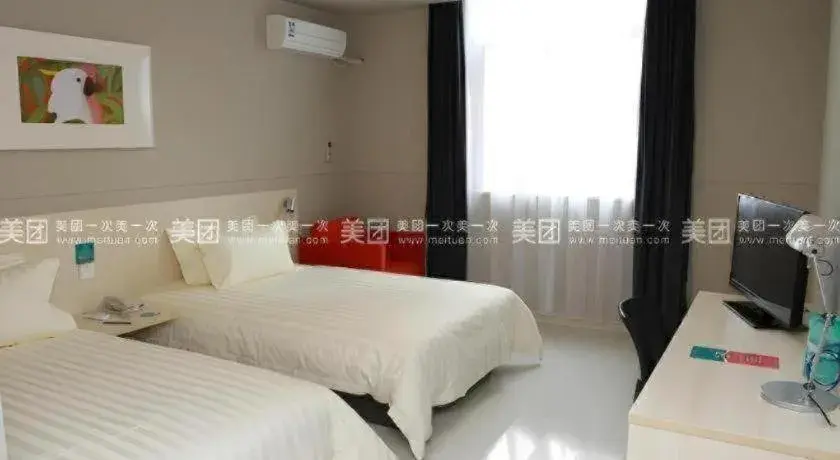 Bed in Jinjiang Inn Tai Zhou Xinghua Yingwu Bridge Branch Bed in Jinjiang Inn Tai Zhou Xinghua Yingwu Bridge Branch