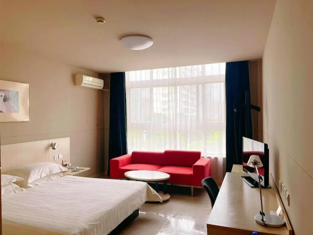 Bed in Jinjiang Inn Tai Zhou Xinghua Yingwu Bridge Branch Bed in Jinjiang Inn Tai Zhou Xinghua Yingwu Bridge Branch