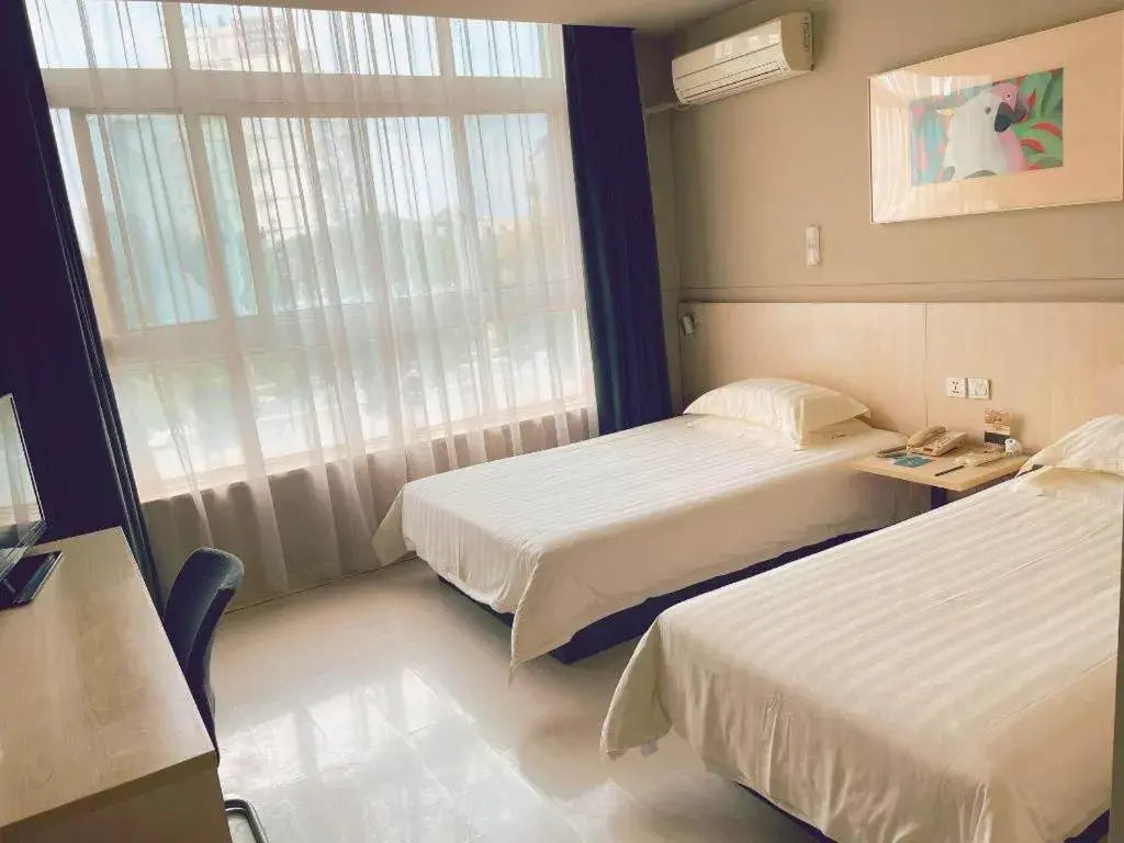 Bed in Jinjiang Inn Tai Zhou Xinghua Yingwu Bridge Branch Bed in Jinjiang Inn Tai Zhou Xinghua Yingwu Bridge Branch