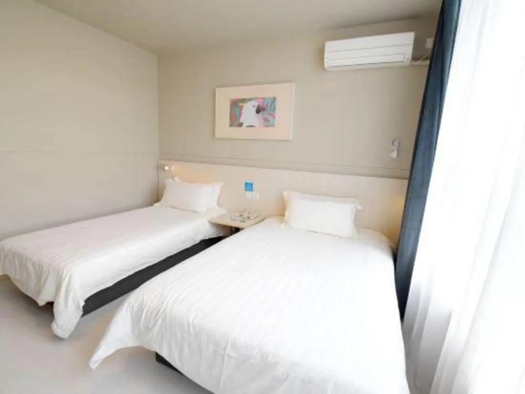 Bed in Jinjiang Inn Tai Zhou Xinghua Yingwu Bridge Branch