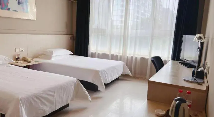 Bed in Jinjiang Inn Tai Zhou Xinghua Yingwu Bridge Branch Bed in Jinjiang Inn Tai Zhou Xinghua Yingwu Bridge Branch