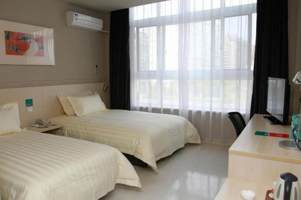 Bed in Jinjiang Inn Tai Zhou Xinghua Yingwu Bridge Branch