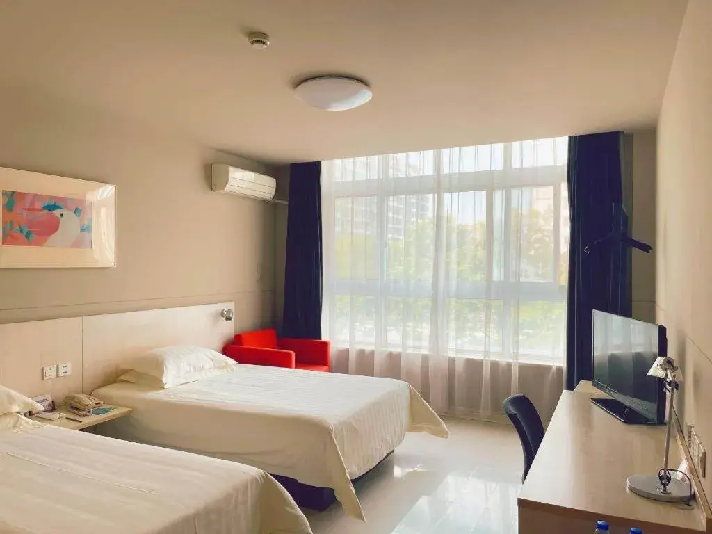 Bed in Jinjiang Inn Tai Zhou Xinghua Yingwu Bridge Branch Bed in Jinjiang Inn Tai Zhou Xinghua Yingwu Bridge Branch