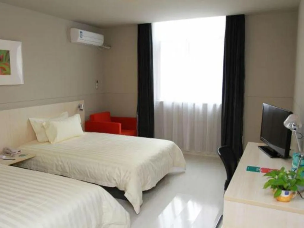 Bed in Jinjiang Inn Tai Zhou Xinghua Yingwu Bridge Branch