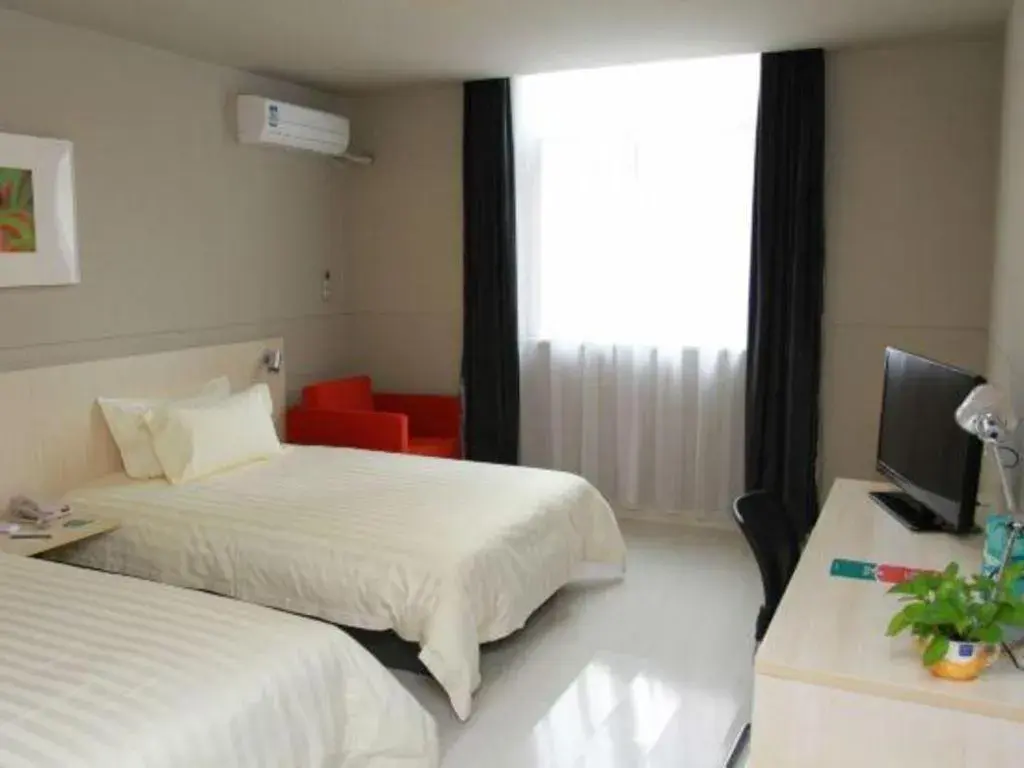 Bed in Jinjiang Inn Tai Zhou Xinghua Yingwu Bridge Branch Bed in Jinjiang Inn Tai Zhou Xinghua Yingwu Bridge Branch