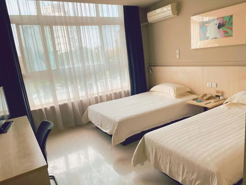 Bed in Jinjiang Inn Tai Zhou Xinghua Yingwu Bridge Branch