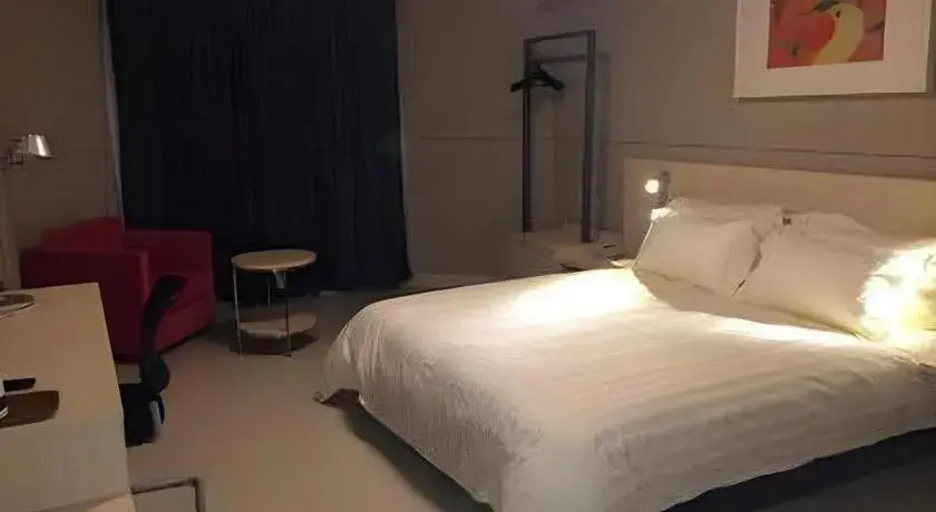 Bed in Jinjiang Inn Tai Zhou Xinghua Yingwu Bridge Branch Bed in Jinjiang Inn Tai Zhou Xinghua Yingwu Bridge Branch