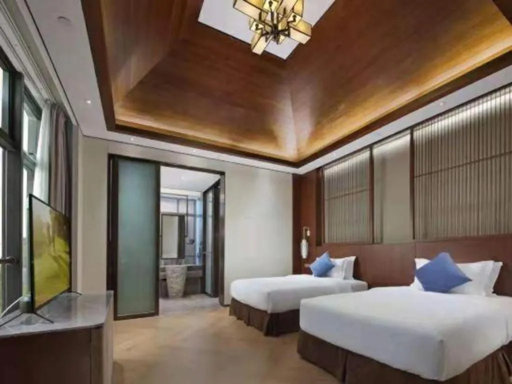 Bed in Fliport Hotel Zhangzhou Yuanshan