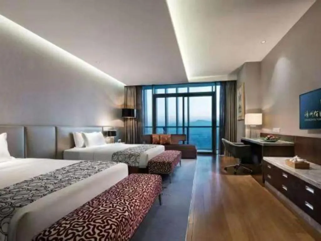 Bed in Fliport Hotel Zhangzhou Yuanshan