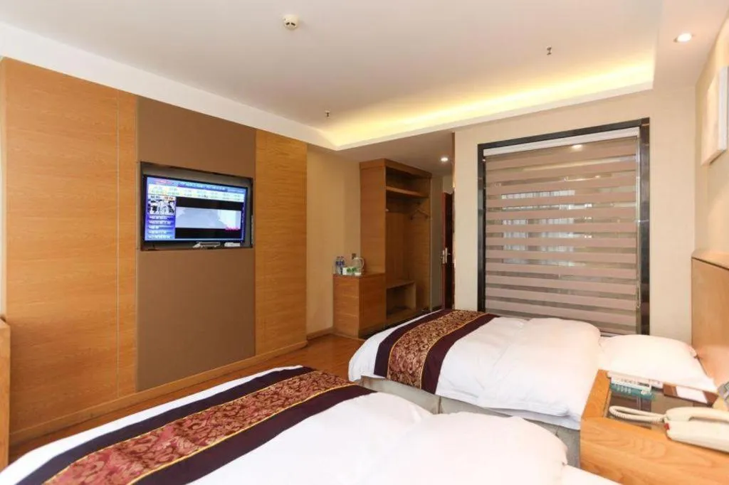 Bed in GreenTree Inn Jiangsu Wuxi Huishan High-Speed Rail Qianzhou Chongwen Road Business Hotel
