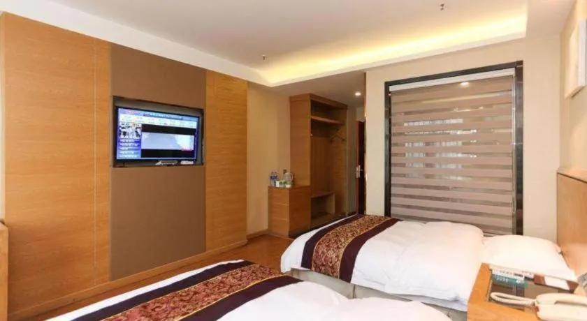 Bed in GreenTree Inn Jiangsu Wuxi Huishan High-Speed Rail Qianzhou Chongwen Road Business Hotel