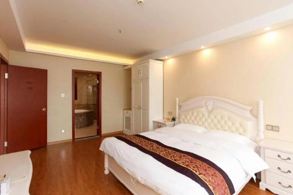 Bed in GreenTree Inn Jiangsu Wuxi Huishan High-Speed Rail Qianzhou Chongwen Road Business Hotel
