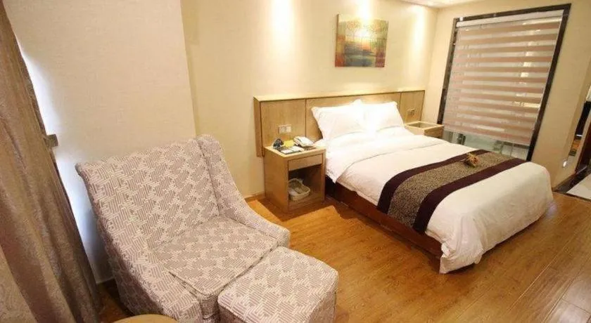 Bed in GreenTree Inn Jiangsu Wuxi Huishan High-Speed Rail Qianzhou Chongwen Road Business Hotel