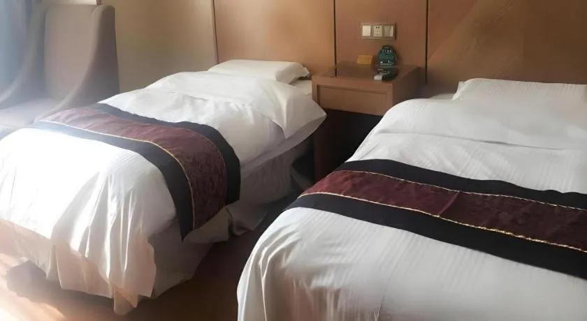 Bed in GreenTree Inn Jiangsu Wuxi Huishan High-Speed Rail Qianzhou Chongwen Road Business Hotel