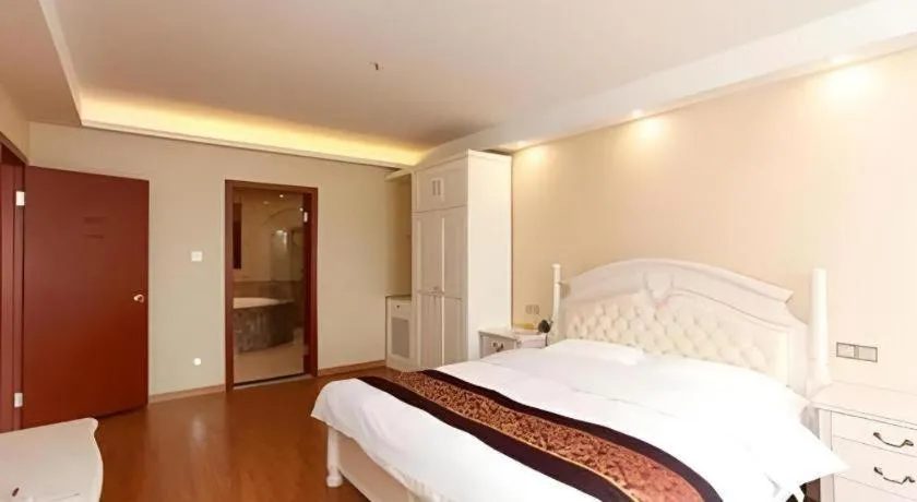 Bed in GreenTree Inn Jiangsu Wuxi Huishan High-Speed Rail Qianzhou Chongwen Road Business Hotel