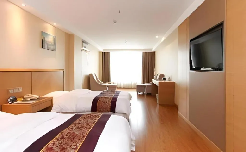 Bed in GreenTree Inn Jiangsu Wuxi Huishan High-Speed Rail Qianzhou Chongwen Road Business Hotel