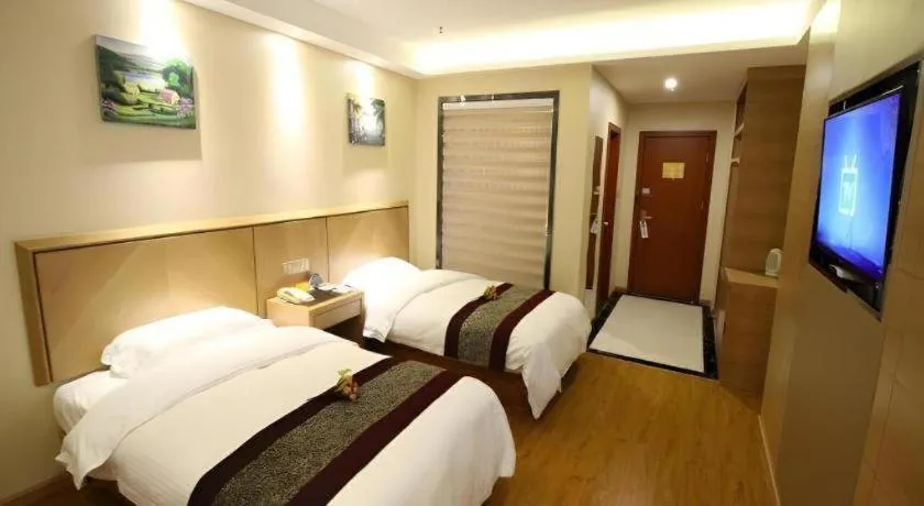 Bed in GreenTree Inn Jiangsu Wuxi Huishan High-Speed Rail Qianzhou Chongwen Road Business Hotel