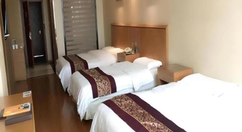 Bed in GreenTree Inn Jiangsu Wuxi Huishan High-Speed Rail Qianzhou Chongwen Road Business Hotel