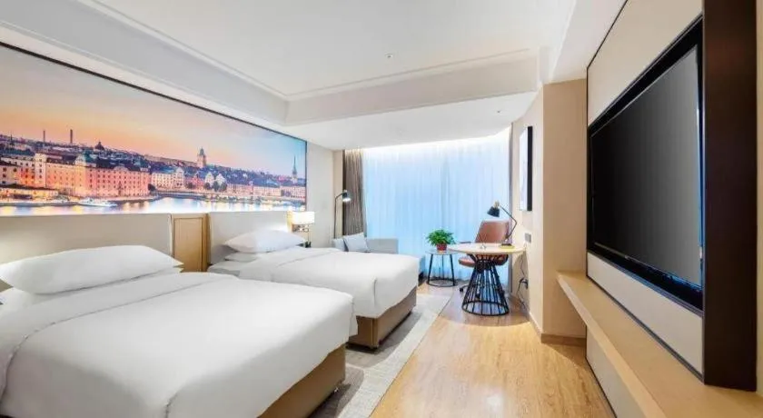 Bed in Vienna Hotel Tianjin Guizhou Road Branch
