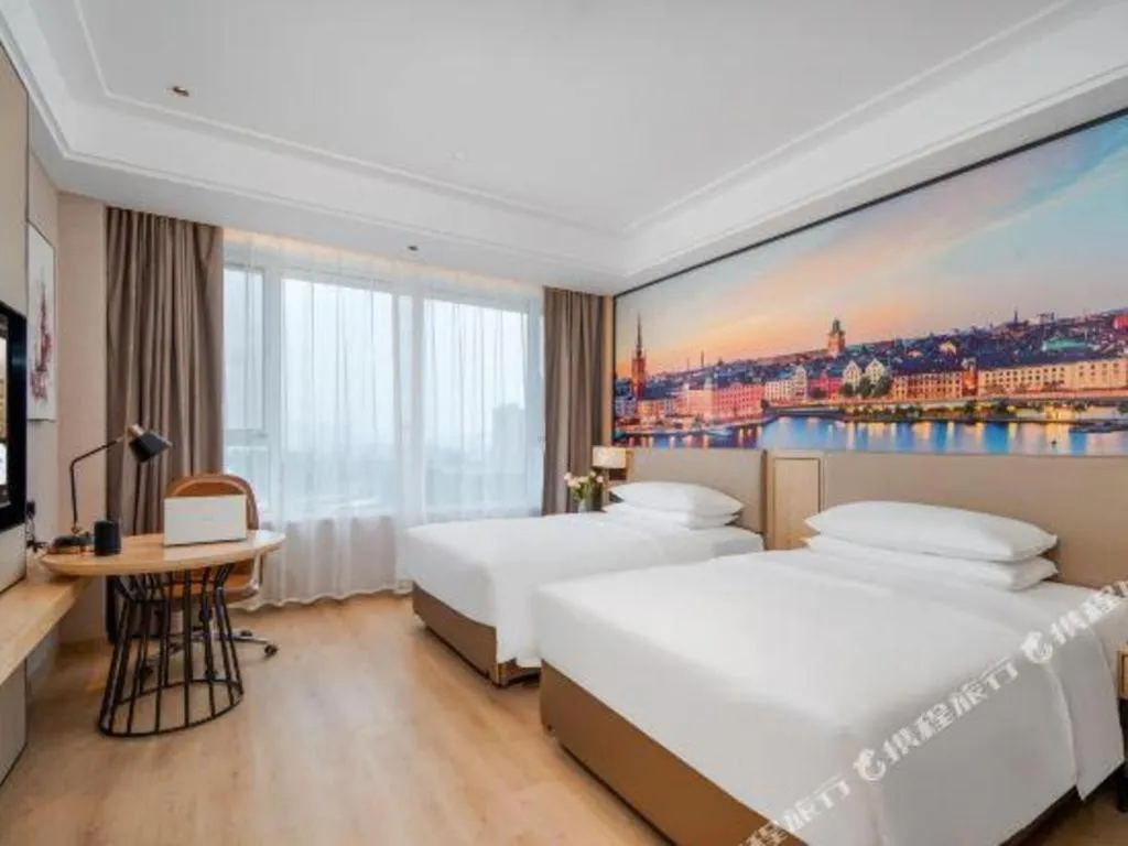 Bed in Vienna Hotel Tianjin Guizhou Road Branch