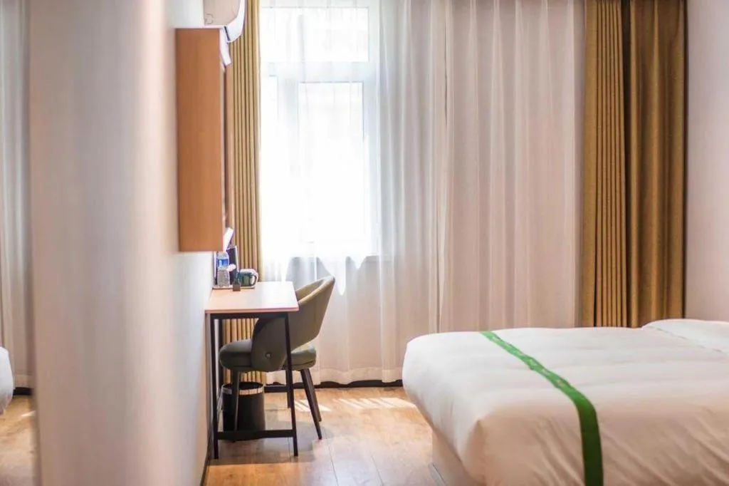 Bed in GreenTree Inn Qingdao Licang Shuyan Road Daweng Square Express Hotel