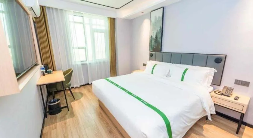 Bed in GreenTree Inn Qingdao Licang Shuyan Road Daweng Square Express Hotel