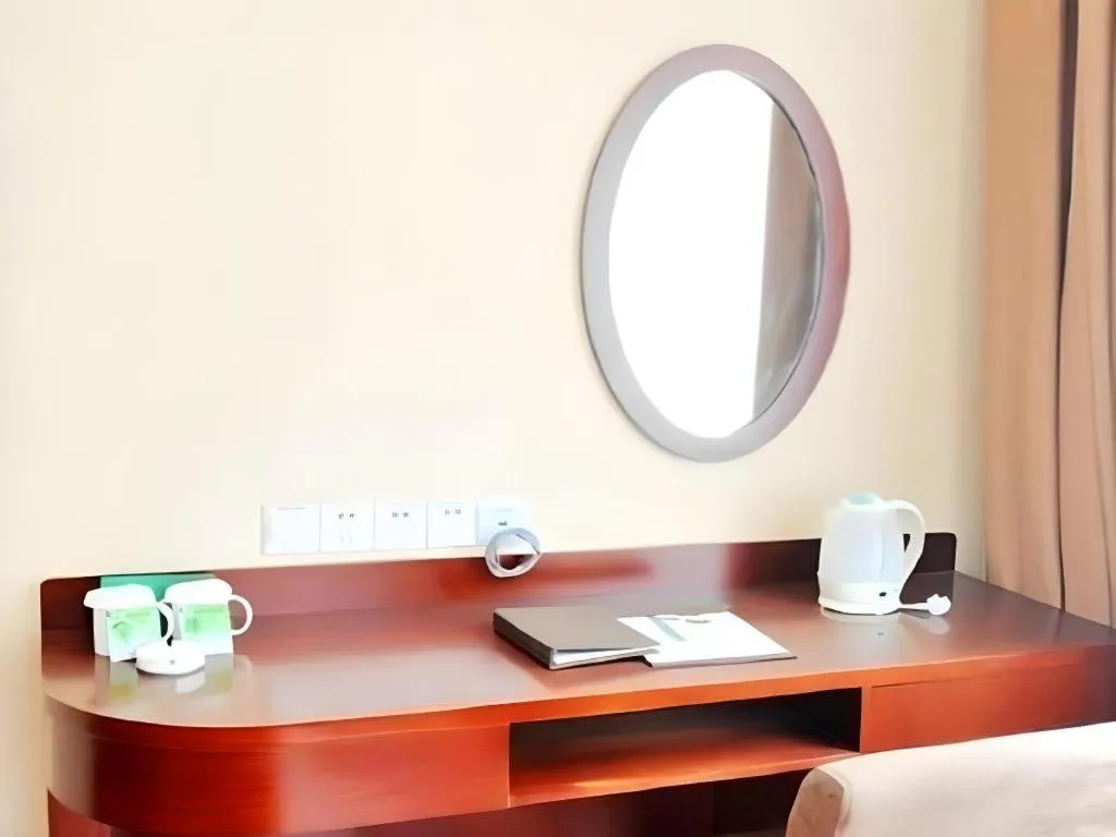 Bed in GreenTree Inn Qingdao Licang Shuyan Road Daweng Square Express Hotel