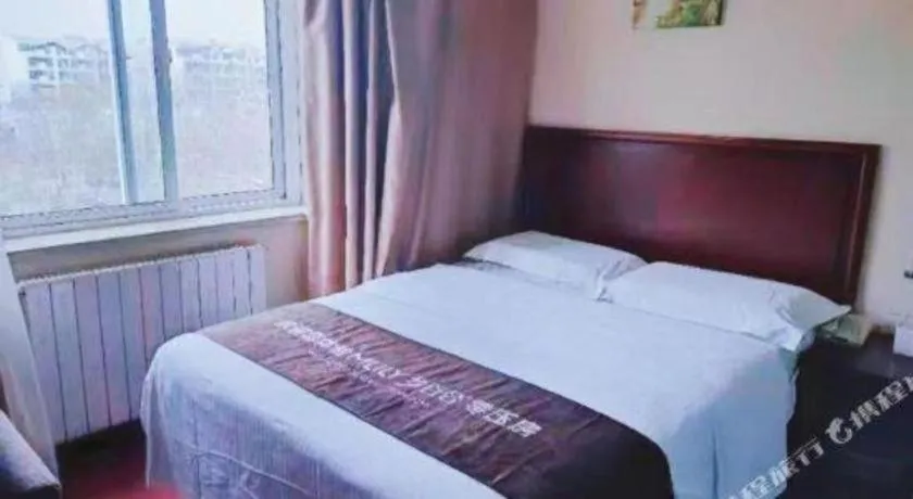 Bed in GreenTree Inn Qingdao Licang Shuyan Road Daweng Square Express Hotel