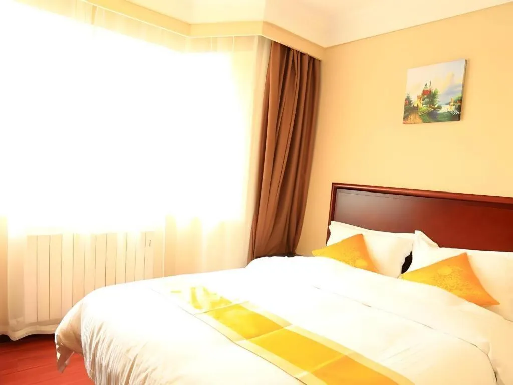 Bed in GreenTree Inn Qingdao Licang Shuyan Road Daweng Square Express Hotel
