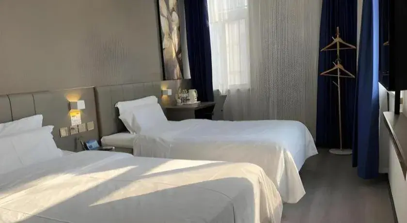 Bed in 7 Days Inn Qingdao Liaoyang West Road Xinye Plaza Metro Station Bed in 7 Days Inn Qingdao Liaoyang West Road Xinye Plaza Metro Station