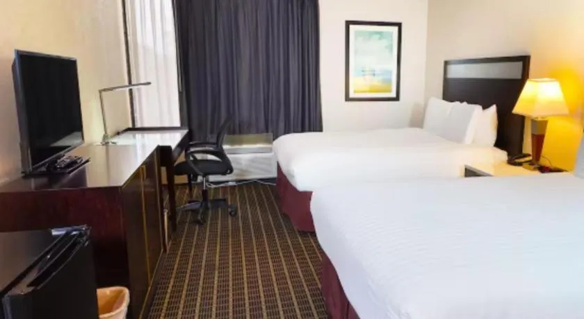 Bed in Alhambra Hotel