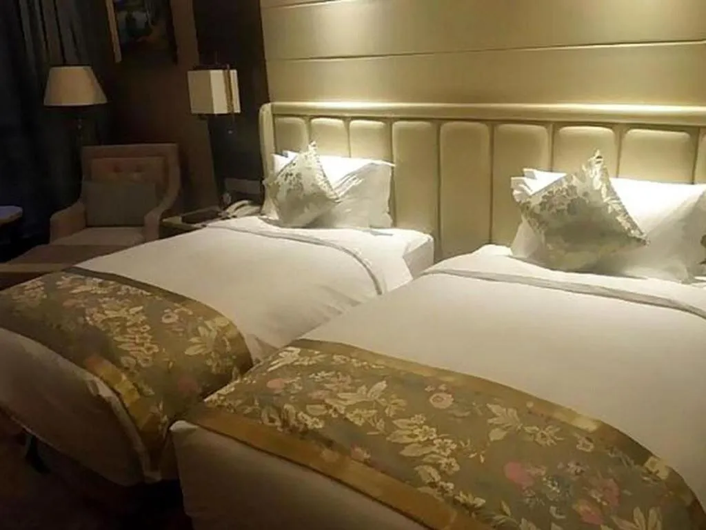 Bed in Howard Johnson Zunyue Hotel Chengdu
