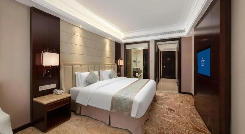 Bed in Howard Johnson Zunyue Hotel Chengdu